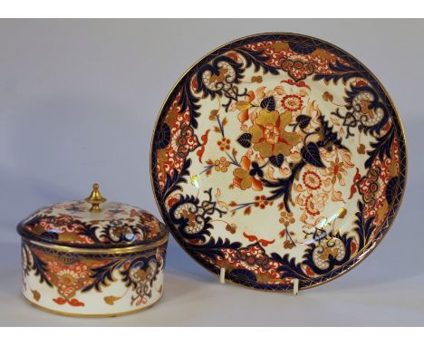 An early 19thC Royal Crown Derby jar and cover, the domed lid with gilt knop, decorated with flowers in red and blue on a cre