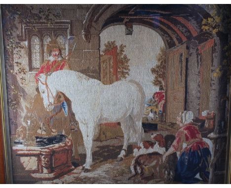 A 19thC tapestry, embroidered with a figure, beside dog, horse and gentleman, before an arched door, in a period rosewood fra