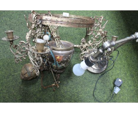 A 20thC metal framed hanging electrolier, the circular ring top held on an elaborate support with pierced floral scroll dish 