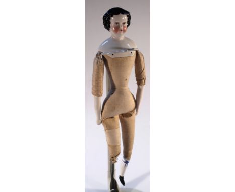A 19thC ceramic pot headed doll, with moulded hair and features picked out in red and blue, of shouldered form with a straw f