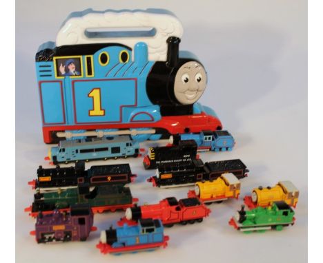 An Ertl Thomas the Tank Engine boxed die-cast set, comprising drains, tenders and carriages and a small quantity of loose tra