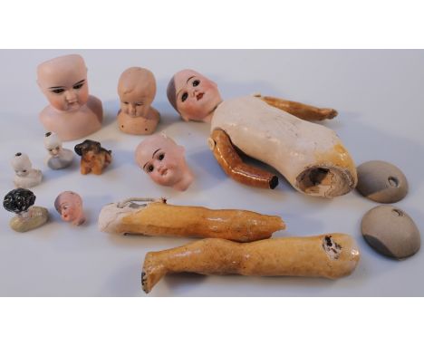 A quantity of late 19thC and later bisque headed miniature dolls and shoulder dolls, to include Alice no. 19114/0A, DEP head,