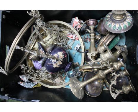 A 20thC brass hanging chandelier, the circular ring top raised above highly elaborate floral scroll supports, joined by a cer