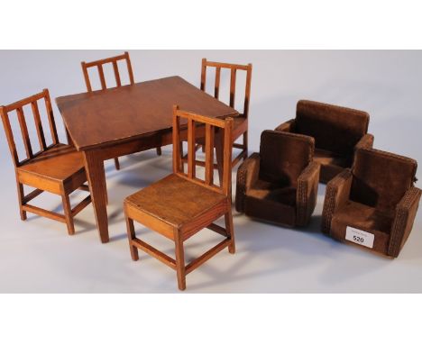 A quantity of doll's house furniture of large scale, comprising of a table and chairs and a three piece suite, each armchair 