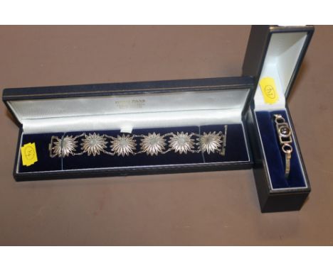 A SILVER BANGLE TOGETHER WITH A SILVER BRACELET
