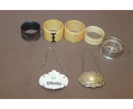 A SELECTION OF NAPKIN RINGS + DECANTER LABELS TO INCLUDE SILVER EXAMPLES