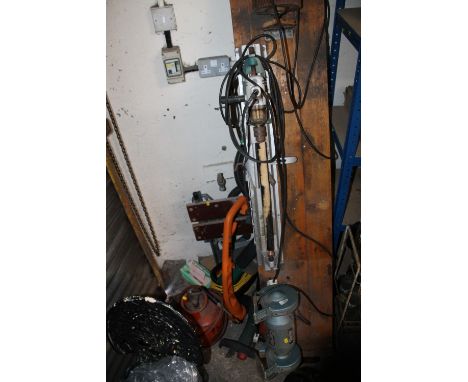 A LARGE WORK BENCH TOP TOGETHER WITH A SELECTION OF POWER TOOLS