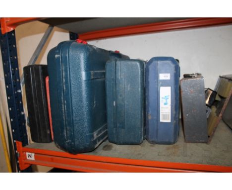 A QUANTITY OF HEAVY DUTY CASED POWER TOOLS, DRILLS ETC