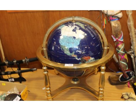 A LARGE ENAMEL GEMSTONE GLOBE