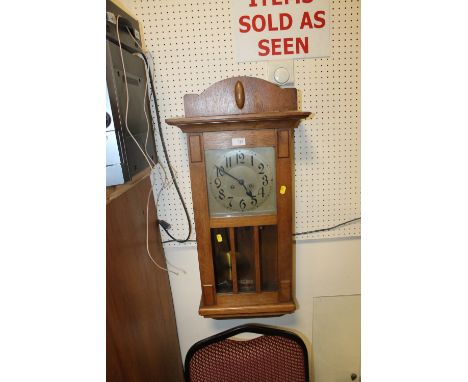 A WALL HANGING CLOCK