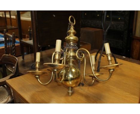 A LARGE BRASS FIVE BRANCH CHANDELIER