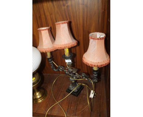 A CAST THREE BRANCH LAMP WITH EAGLE DETAIL
