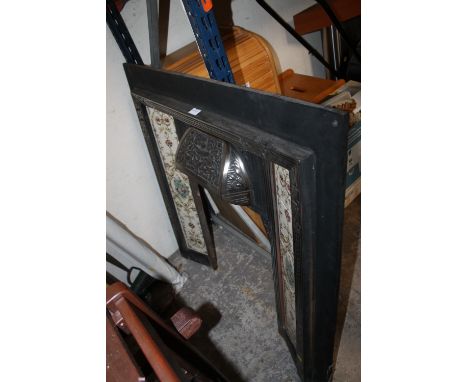 A CAST IRON FIRE SURROUND