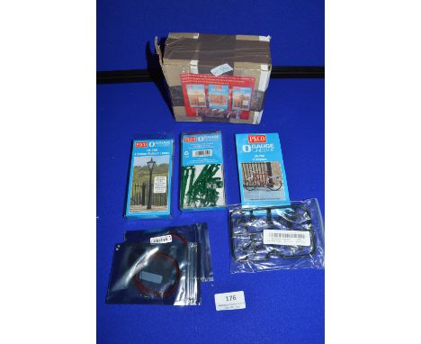 Two Packs of O Gauge Pico Street Lighting Cables and a Pack of O Gauge 764 Bicycles
