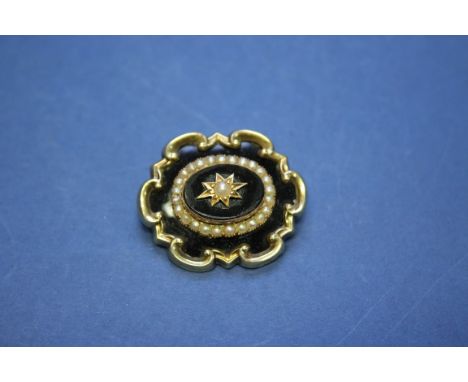 A Victorian enamel and unmarked gold mourning brooch; together with pair of Victorian carved jet pendant earrings; and a smal