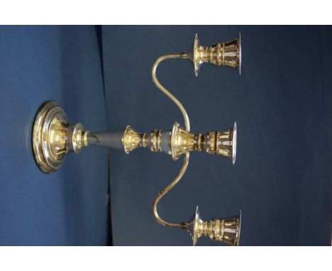 A silver three branch candelabrum, by C B & S, Sheffield 1973, 27cm, 837g all in.