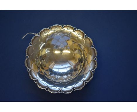 A silver pedestal bon bon dish, by Mappin & Webb, Sheffield 1956, of chrysanthemum design, 12cm, 87g.