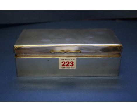 A silver cigarette box, by A & J Zimmeman, Birmingham 1910, 19cm.