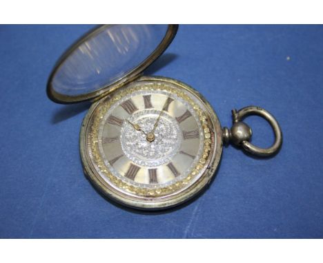 A silver pocket watch, dial decorated Roman numerals, key wind.