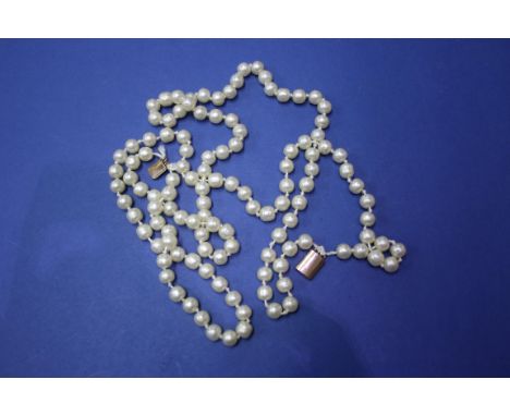 A two strand pearl necklace having unmarked metal clasp, 50cm.
