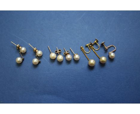 A pair of 9ct gold pearl eardrops; together with three pairs of various gold and pearl ear studs; and an odd ear stud.