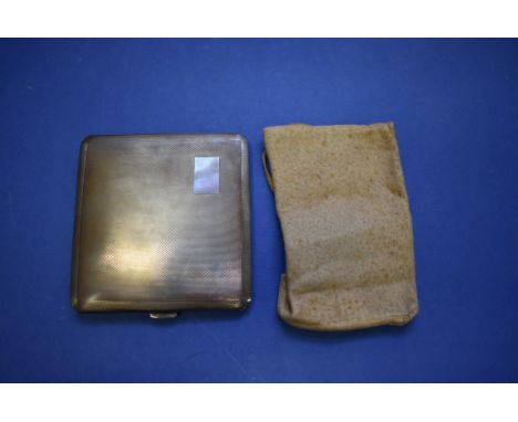 A silver engine cigarette case, by W T Toghill & Co, Birmingham 1954, 102g.