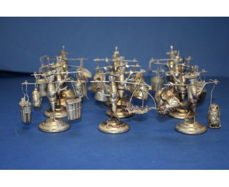 A set of twelve Chinese sterling silver novelty hawker figures, by Wai Kee, Hong Kong, 6cm high. (1 broken).