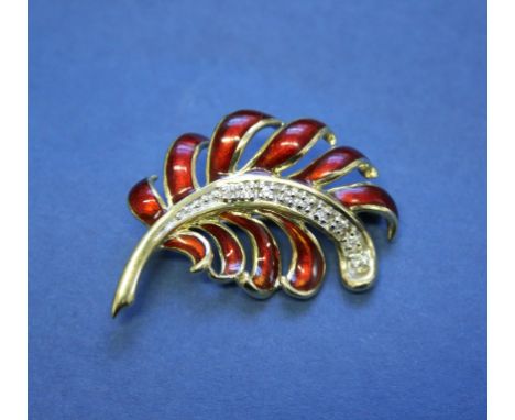 A House of Faberge 14k gold and enamel stylised fern brooch decorated diamonds.