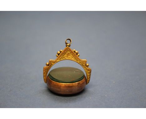 A 9ct gold bloodstone and carnelian swivel fob seal; together with an 18ct gold and enamel brooch in form of quiver, bow and 