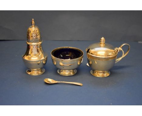 A silver three piece cruet set, by Roberts & Belk, Sheffield 1984. 244g.