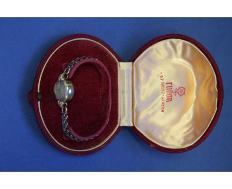 A vintage Tudor 9ct gold ladies wristwatch, in original box with guarantee card dated 1959, 14.9g all in.