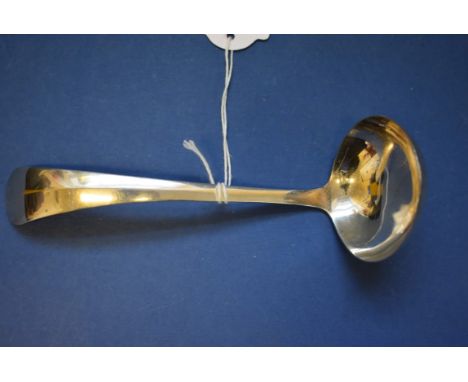 A Dutch white metal sauce ladle.