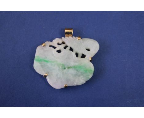 A carved and pierced jade lotus flower and stork, having unmarked yellow metal pendant mount.