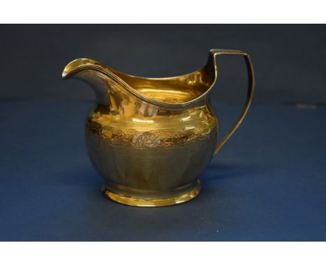 A George lll silver milk jug, London 1802, 124g.