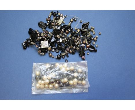 A French jet black pearl and white metal necklace (a/f); together with a quantity of black and white pearl beads.