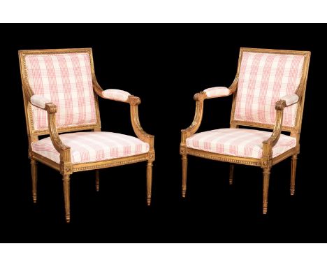 A pair of French giltwood armchairs, circa 1860, with later checked upholstery, 88cm highCondition Report: Marks, knocks, scr