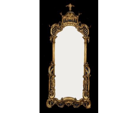 A giltwood wall mirror in George III style, 20th century, after the manner of Thomas Chippendale style, with pagoda top and b