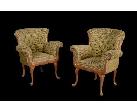 A pair of beech salon chairs, in the French Louis XV style, mid 20th century, each 98cm highProvenance: From the collection o