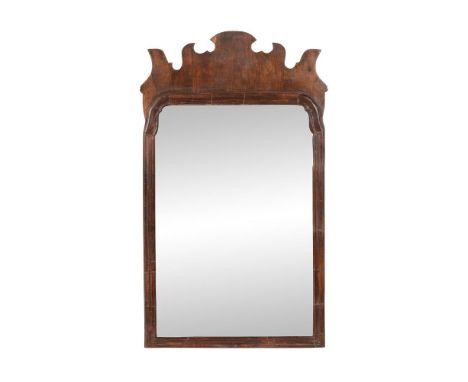 A George II walnut fret-framed wall mirror, circa 1750, 70cm high, 40cm wide, together with a George III giltwood wall mirror