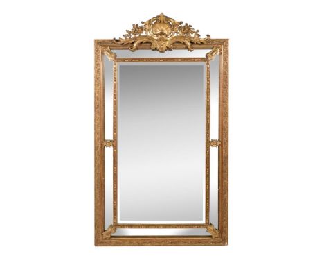 A Continental giltwood wall mirror, circa 1870, 170cm high, 98cm wideCondition Report: Marks, knocks, scratches, abrasions co