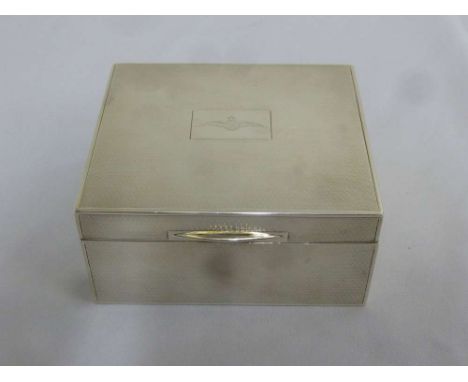 Silver engine turned cigarette box, cedar lined the hinged cover with RAF emblem, London 1958