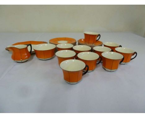 An Art Deco porcelain teaset to include plates, cups, saucers (36)