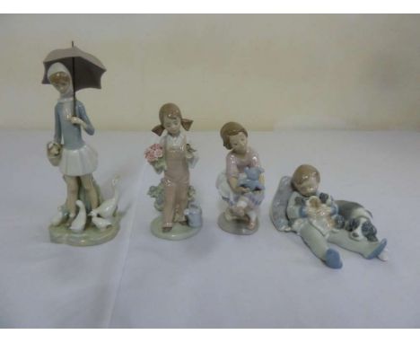 Four Lladro figurines of children
