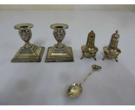 Pair of silver dwarf candlesticks Sheffield 1905, a silver matching salt and pepper and a thistle teaspoon