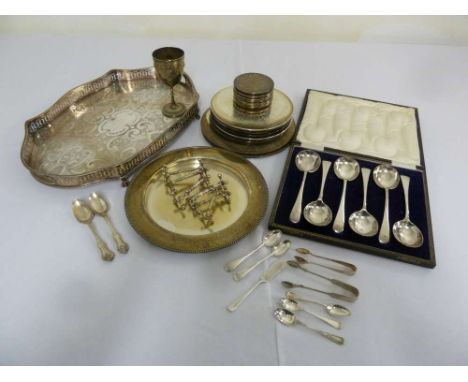 Quantity of silver plate to include a tray, place mats, cased spoons, knife rests and flatware