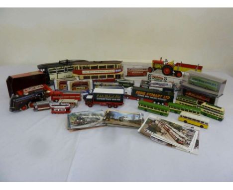 A quantity of Corgi Eddie Stobart and other lorries, buses and trams to include two City of Glasgow boxed trams, Matchbox tro