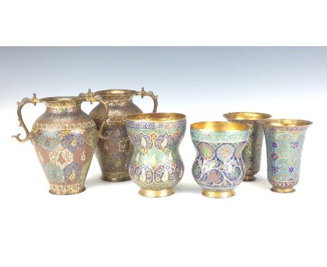 Six 19th Century Indian enamel and gilt copper Vases, Kashmir, Including a pair with zoomorphic handles, tallest 6 1/2in (6)