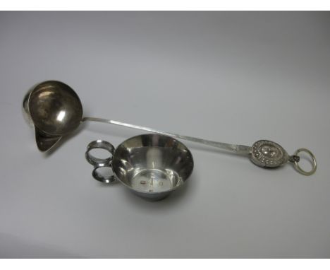 A modern silver designer Soup Ladle with spout and strainer having double mask finial and ring handle, London 1979 and a Cand