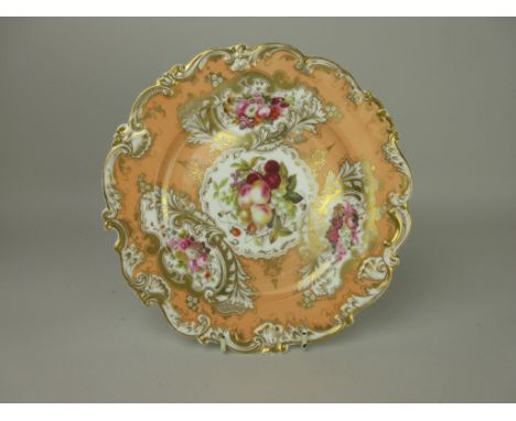 A Chamberlain Worcester porcelain Plate with shaped edge, panels of flowers on a salmon pink ground with gilt decoration