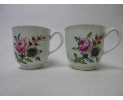 A pair of early Worcester polychrome Cups floral painted in coloured enamels